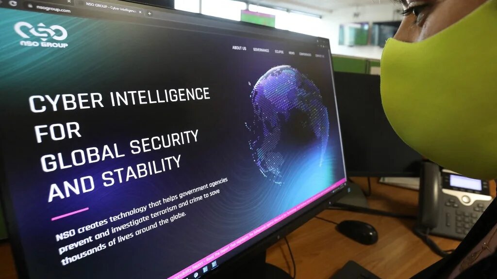 A woman checks the website of Israel-made Pegasus spyware at an office in the Cypriot capital Nicosia on 21 July 2021