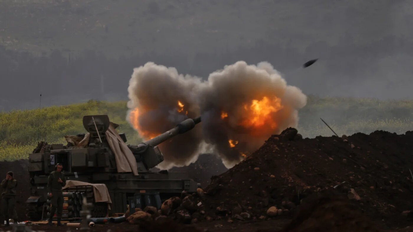 An Israeli artillery unit deployed in the Upper Galilee in northern Israel, near the Lebanon border, fires towards southern Lebanon on 14 March 2026 (AFP)