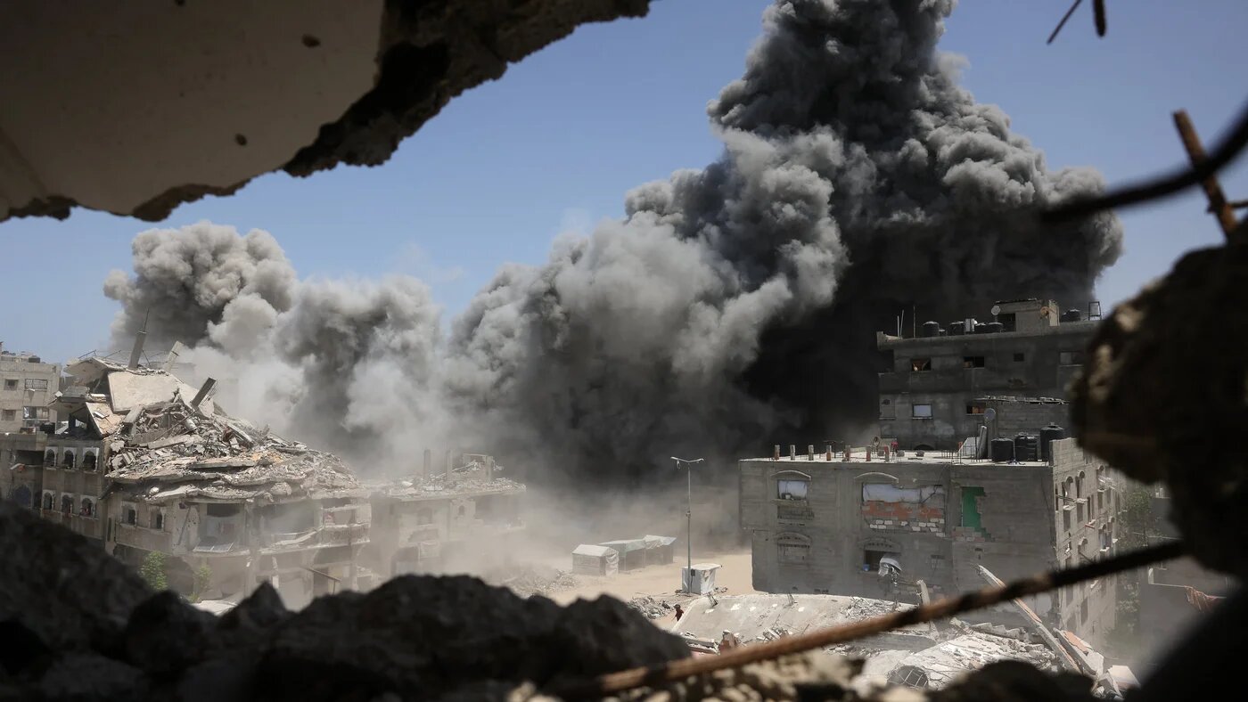 Smoke and debris rise following an Israeli strike in Jabalia, north Gaza, on 1 June, 2025 (AFP/Bashar Taleb)