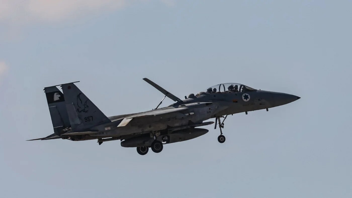 An Israeli fighter jet returning to base flies above an area near Tel Aviv on 26 September 2024 (Gil Cohen-Magen/AFP)