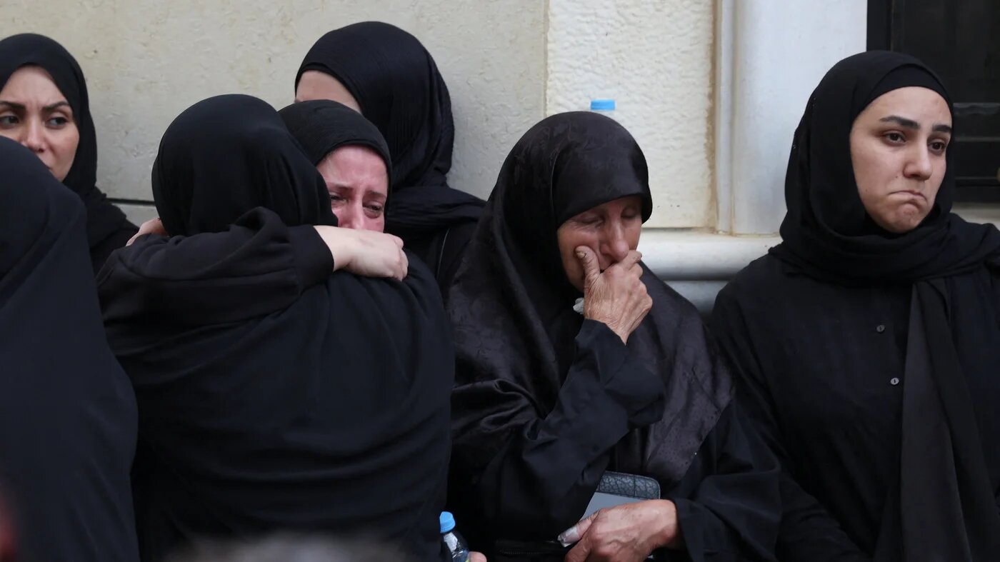 Lebanese women mourn victims of an Israeli strike, in the village of Qennarit, in southern Lebanon, 21 June, 2026 (Aziz Taher/Reuters)