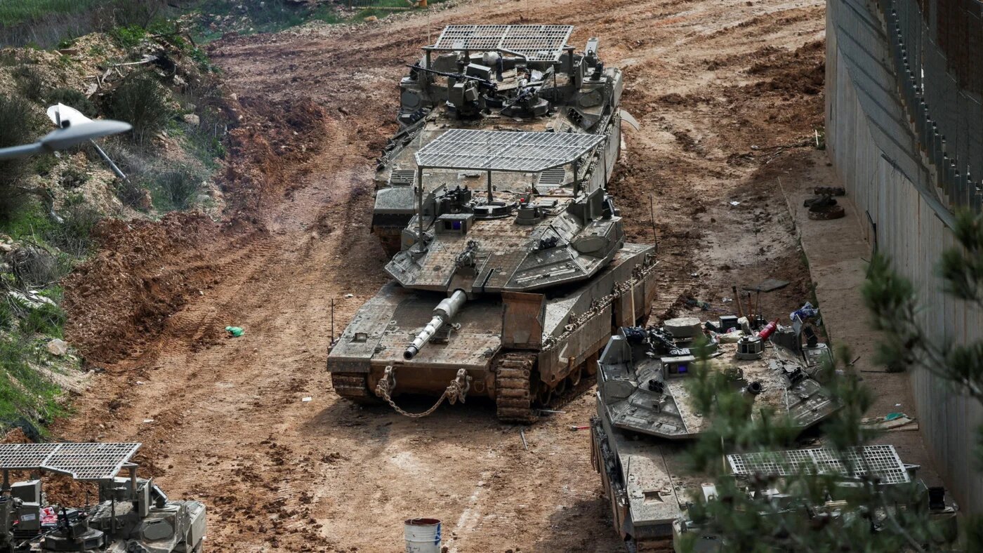 Israeli military vehicles at the Israel-Lebanon border, following an escalation between Hezbollah and Israel amid the U.S.-Israeli conflict with Iran, as seen from northern Israel, 4 March 2026 (Reuters)