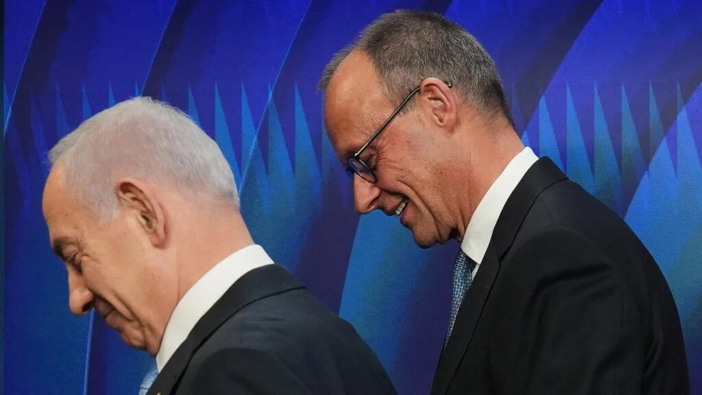 Israeli Prime Minister Benjamin Netanyahu and German Chancellor Friedrich Merz leave after a joint news conference in Jerusalem on 7 December 2025 (Ariel Schalit/AFP)