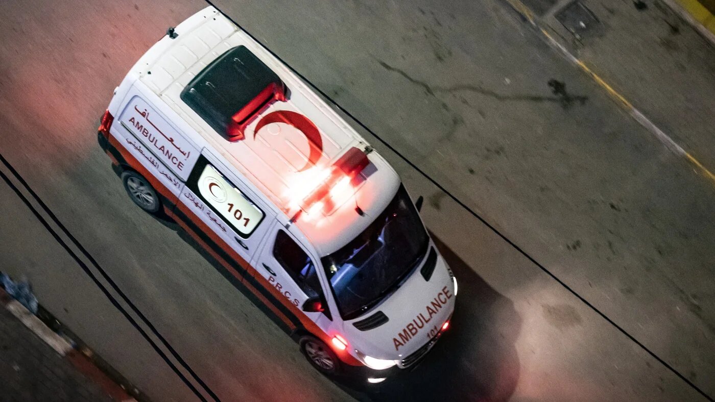 An ambulance arrives during a raid by the Israeli army in the occupied West Bank Jenin refugee camp on 16 November, 2023 (AFP/Fadel Senna)