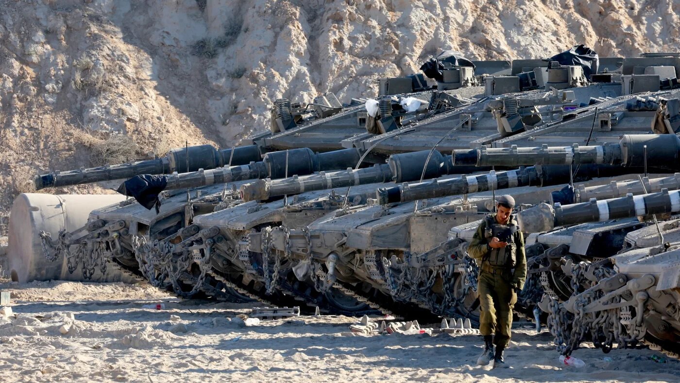 Israeli army tanks take position at the border between Israel and the Gaza Strip on 29 May 2025 (AFP)
