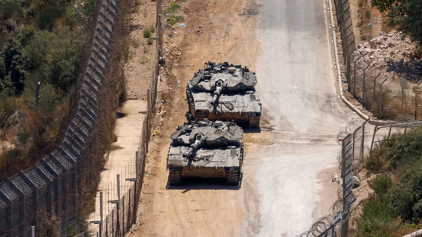 Israeli troops patrol the border fence with Syria near the Druze village of Majdal Shams in the Israeli-occupied Golan Heights on 23 July 2025 (Jalaa Marey/AFP)