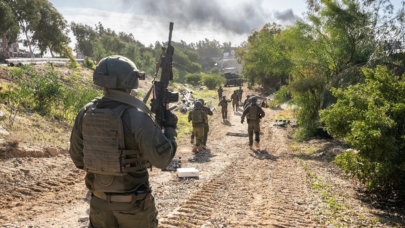This handout picture released by the Israeli army on 26 January 2024 shows Israeli soldiers in the Gaza Strip (AFP/Israeli army)