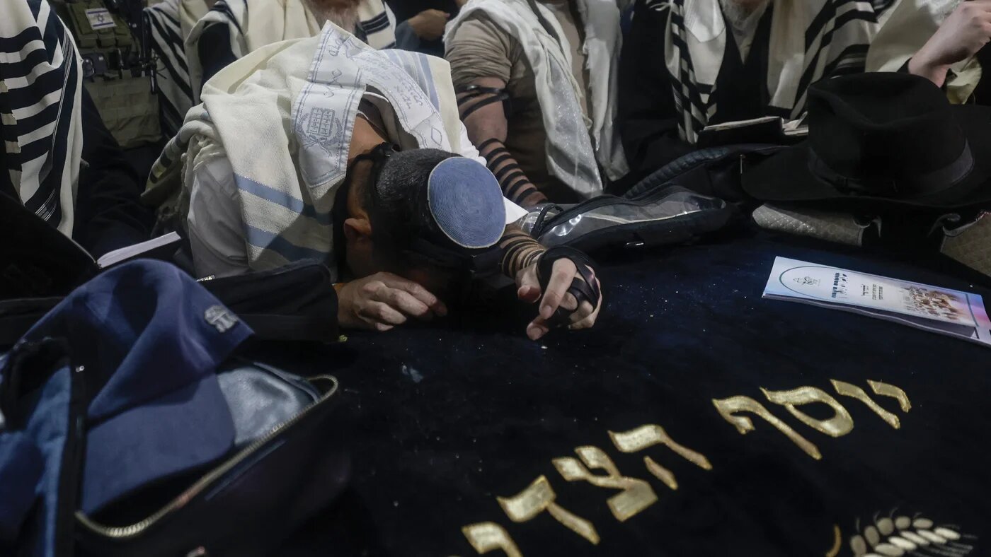 Israeli ultra-nationalists and settlers pray at Joseph’s Tomb in Nablus, occupied West Bank, on 29 January, 2026 (AFP/Menahem Kahana)