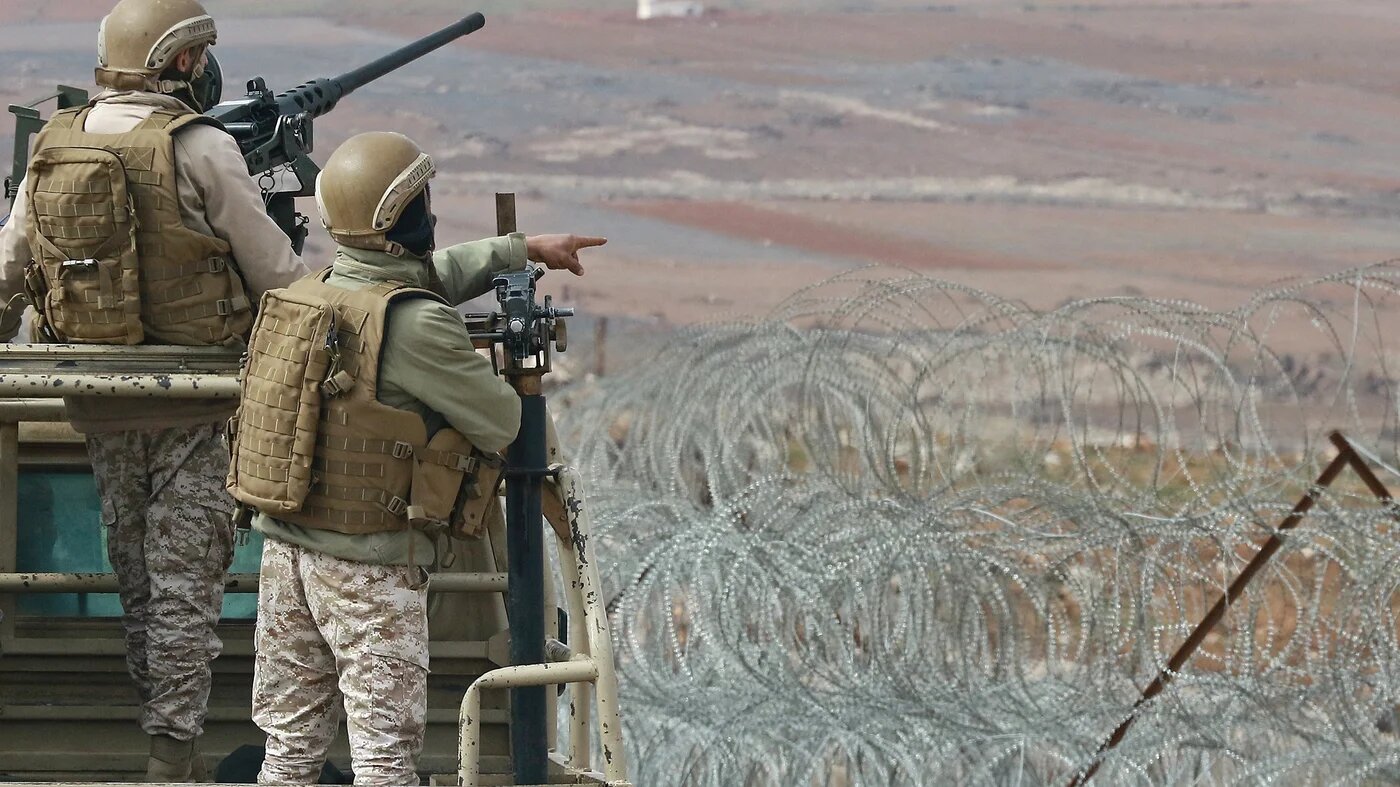 Jordanian soldiers patrol along the border with Syria to prevent trafficking during a tour organised by the Jordanian Army on 17 February 2022. (AFP)