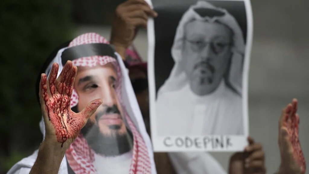 A demonstrator dressed as Crown Prince Mohammed bin Salman with blood on his hands protests outside the Saudi embassy in Washington, DC on 10 October 2018.