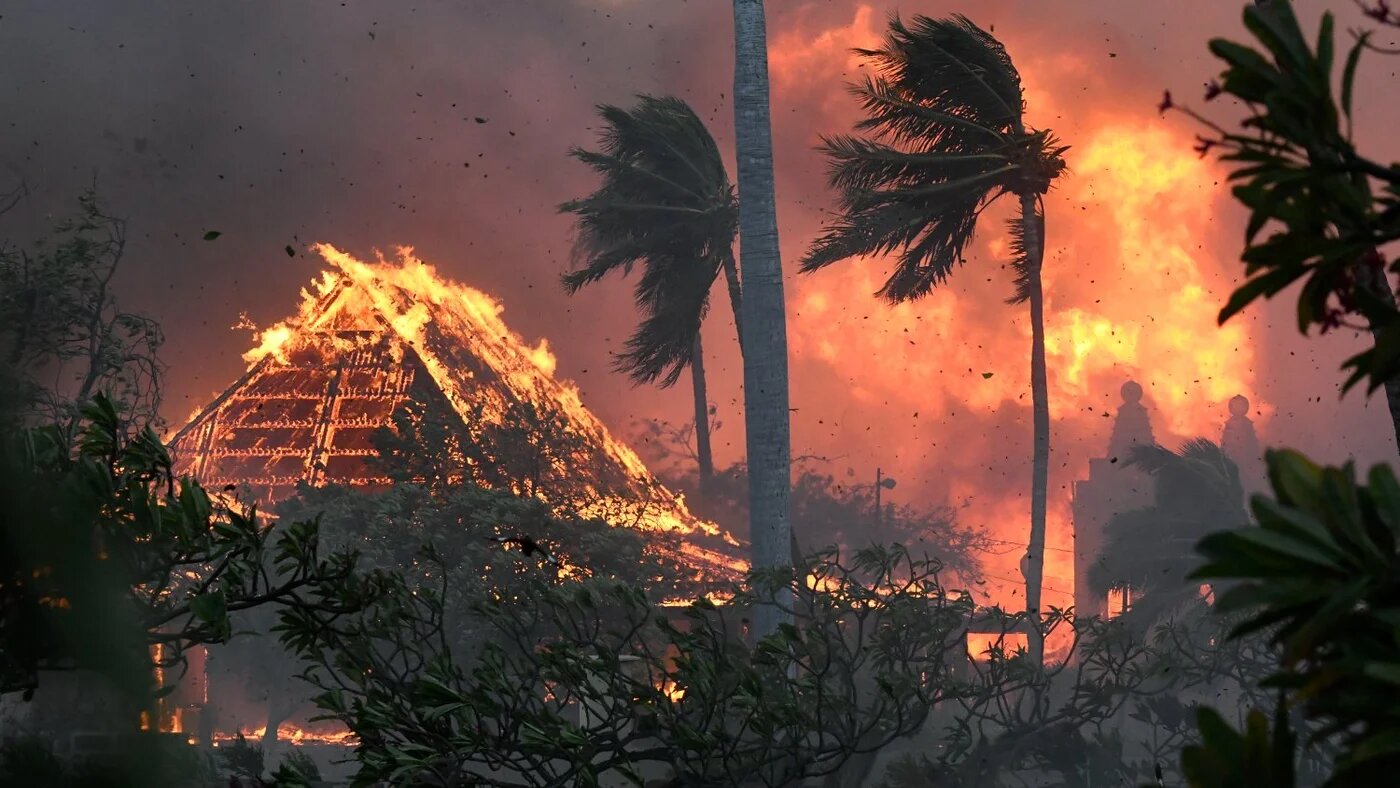 The hall of historic Waiola Church in Lahaina and nearby Lahaina Hongwanji Mission are engulfed in flames along Wainee Street, 8 August 2023, in Lahaina, Hawaii.