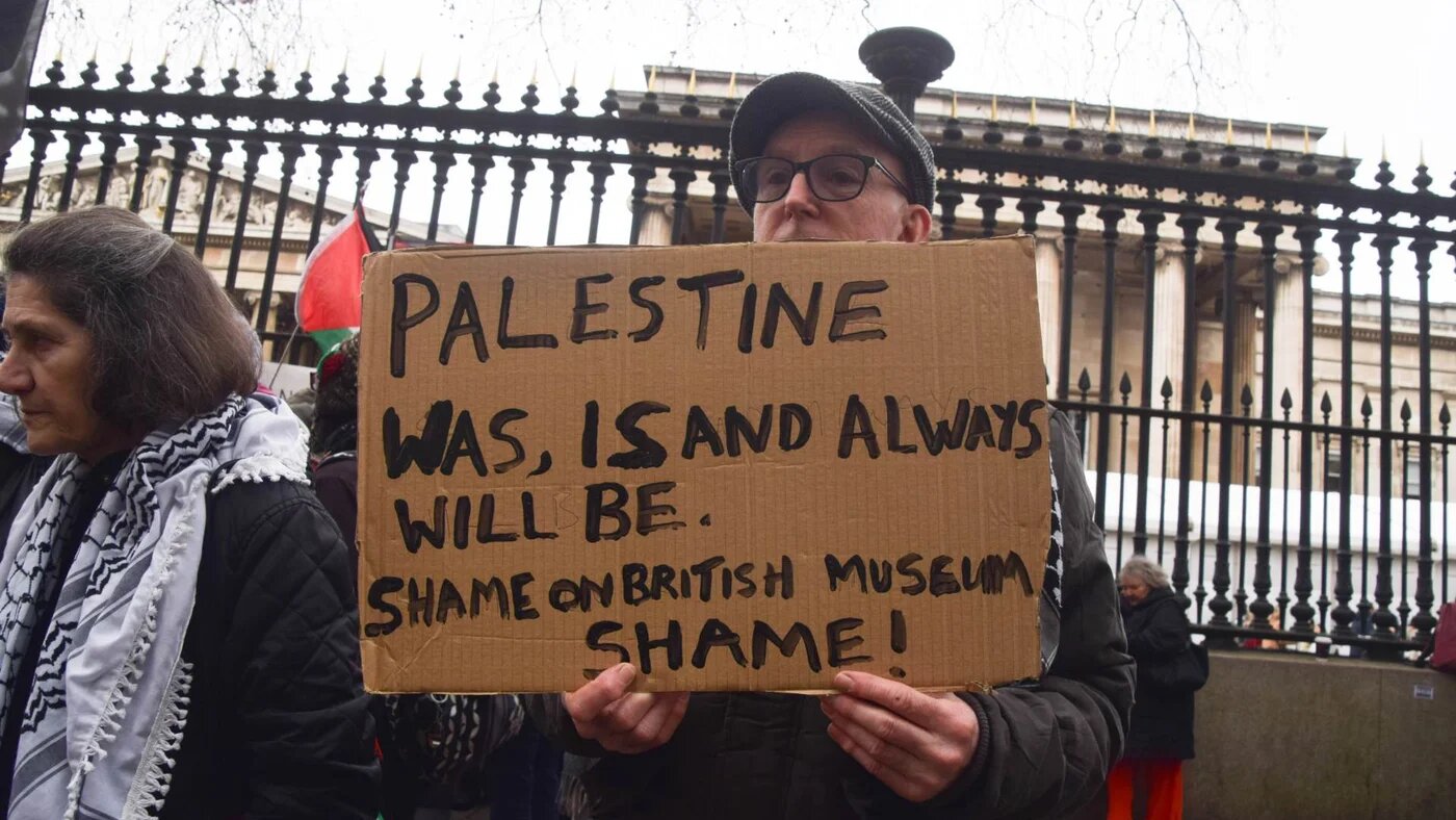 Demonstrator holds a sign at a British Museum protestFebruary 2026 