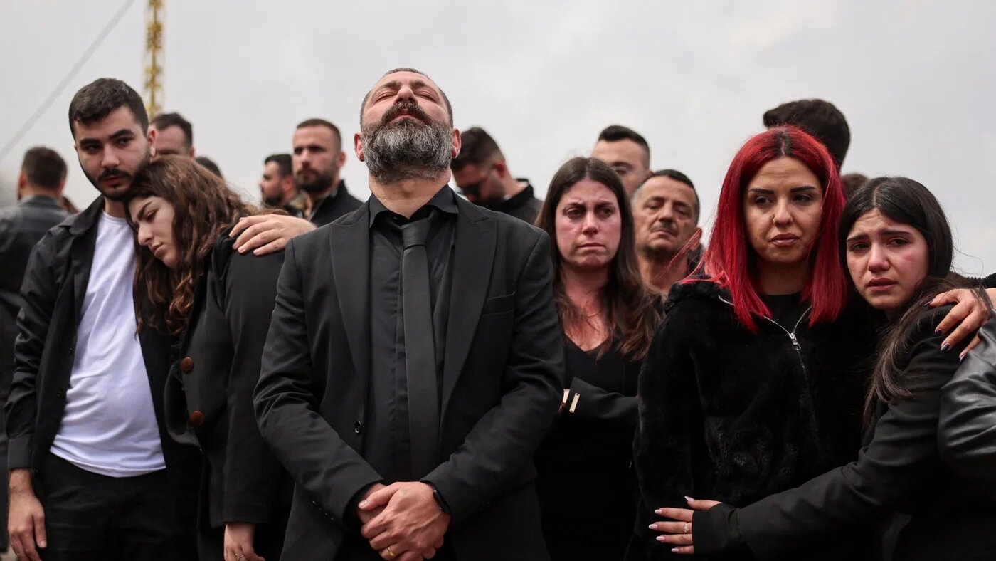 Mourners wait for the funeral procession of Pierre Moawad, an official from the Christian Lebanese Forces Party, and his wife Flavia, who were killed in an Israeli strike, in Yahchouch, Lebanon 7 April 2026 (Reuters/Yara Nardi)