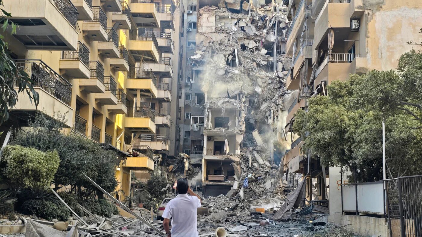A man looks at the destruction at the site of an Israeli strike in Sour, southern Lebanon, on 28 May 2026 (Kawnat Haju/AFP)