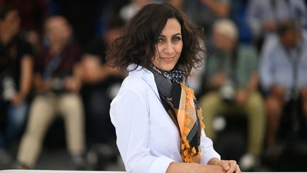 The director of Mediterranean Fever, Maha Haj, is photographed at the 75th edition of the Cannes Film Festival in Cannes, southern France, on 25 May 2022 (AFP)