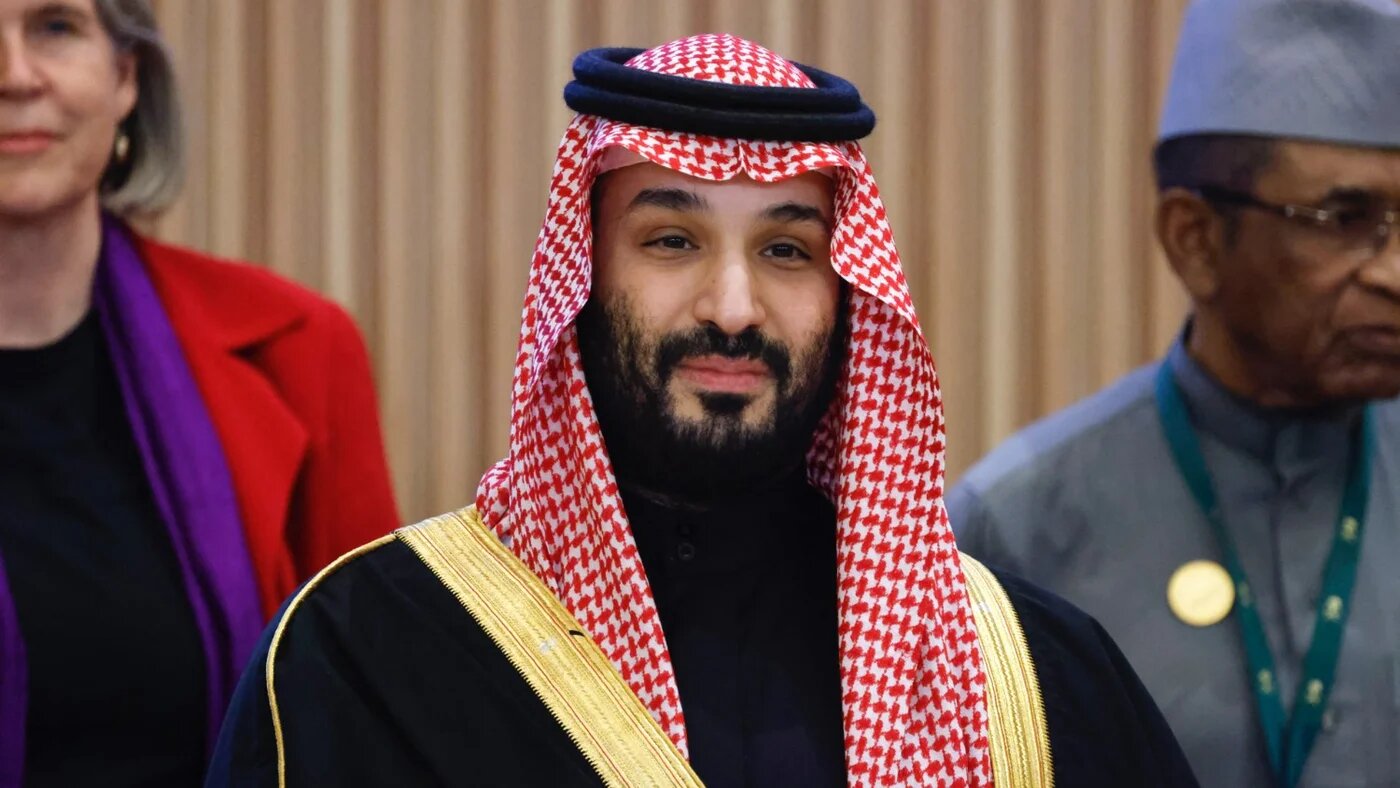 Saudi Arabia's Crown Prince Mohammed bin Salman looks on during a group photo at the One Water Summit in the capital Riyadh on 3 December 2024 (Ludovic Marin/Pool/AFP)