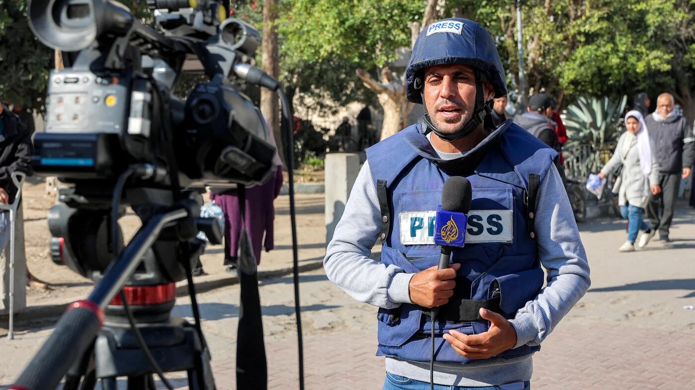 Al Jazeera correspondent Mohammed Qreiqeh reports in Gaza City on 1 December, 2024 (AFP)