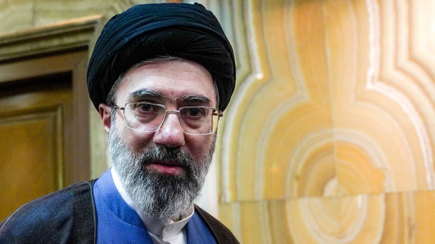 In this picture obtained from Iran's Isna news agency, Mojtaba Khamenei looks on in Tehran on 13 October 2024 (Hamed Jafarnejad/Isna/AFP)