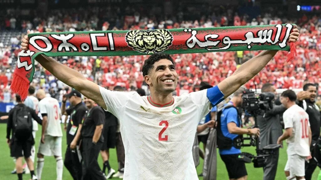 Moroccan team captain Achraf Hakimi celebrates after winning the 2026 World Cup round-of-16 match against Canada at Houston Stadium on 4 July 2026 (Ronaldo Schemidt/AFP)