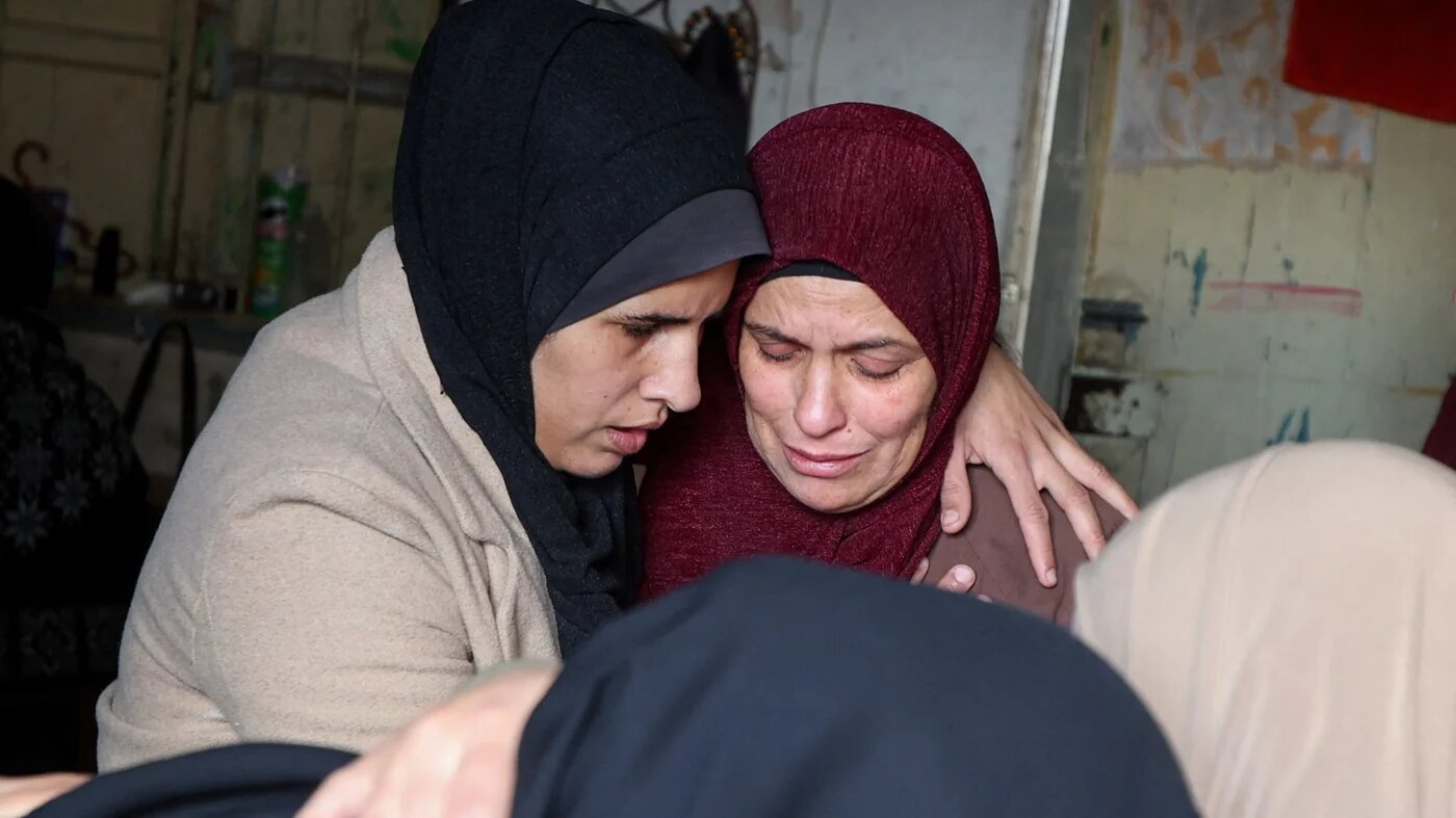 The mother of Palestinian policeman Khaled al-Zayan, who was killed in an Israeli attack on a checkpoint, at his funeral in Khan Younis, south Gaza, 27 February, 2026 (Reuters/Ramadan Abed)