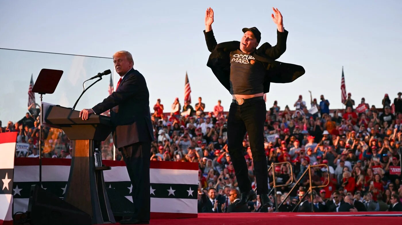 Musk appears alongside US President Donald Trump on the campaign trail in Butler, Pennsylvania on 4 October 2024 (Jim Watson/AFP)
