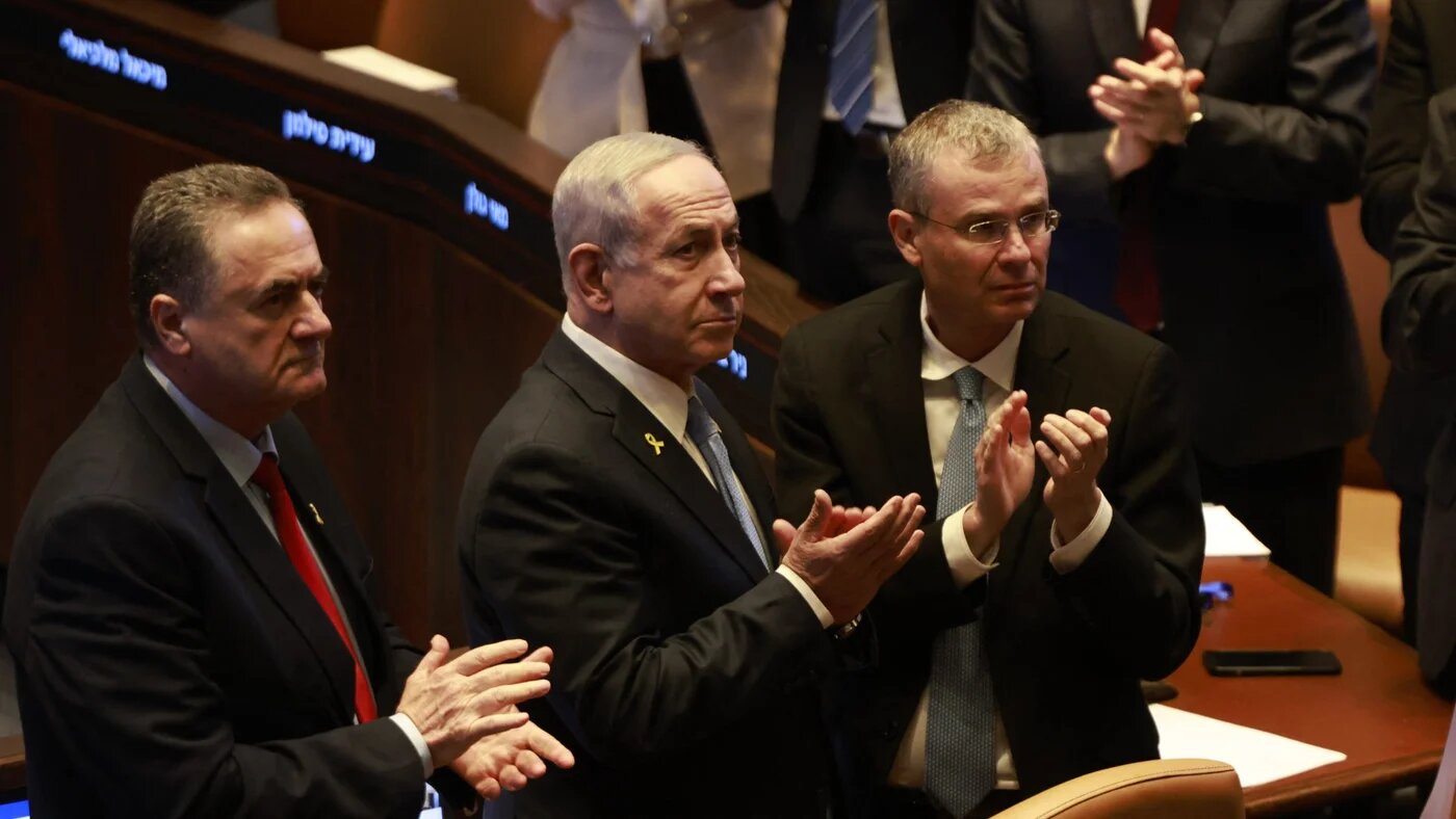 Israel's Defence Minister Yisrael Katz, Prime Minister Benjamin Netanyahu, and Justice Minister Yariv Levin at the Israeli parliament in Jerusalem on 11 June 2025 (AFP/Menahem Kahana)