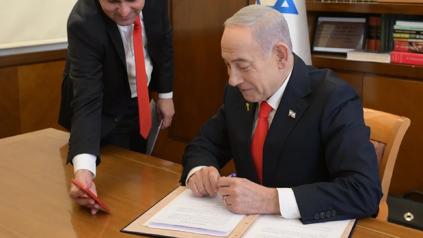 Israeli Prime Minister Benjamin Netanyahu speaks during a video call with Somaliland’s president as he signs a declaration recognising Somaliland as a state (X/Israeli PM office)