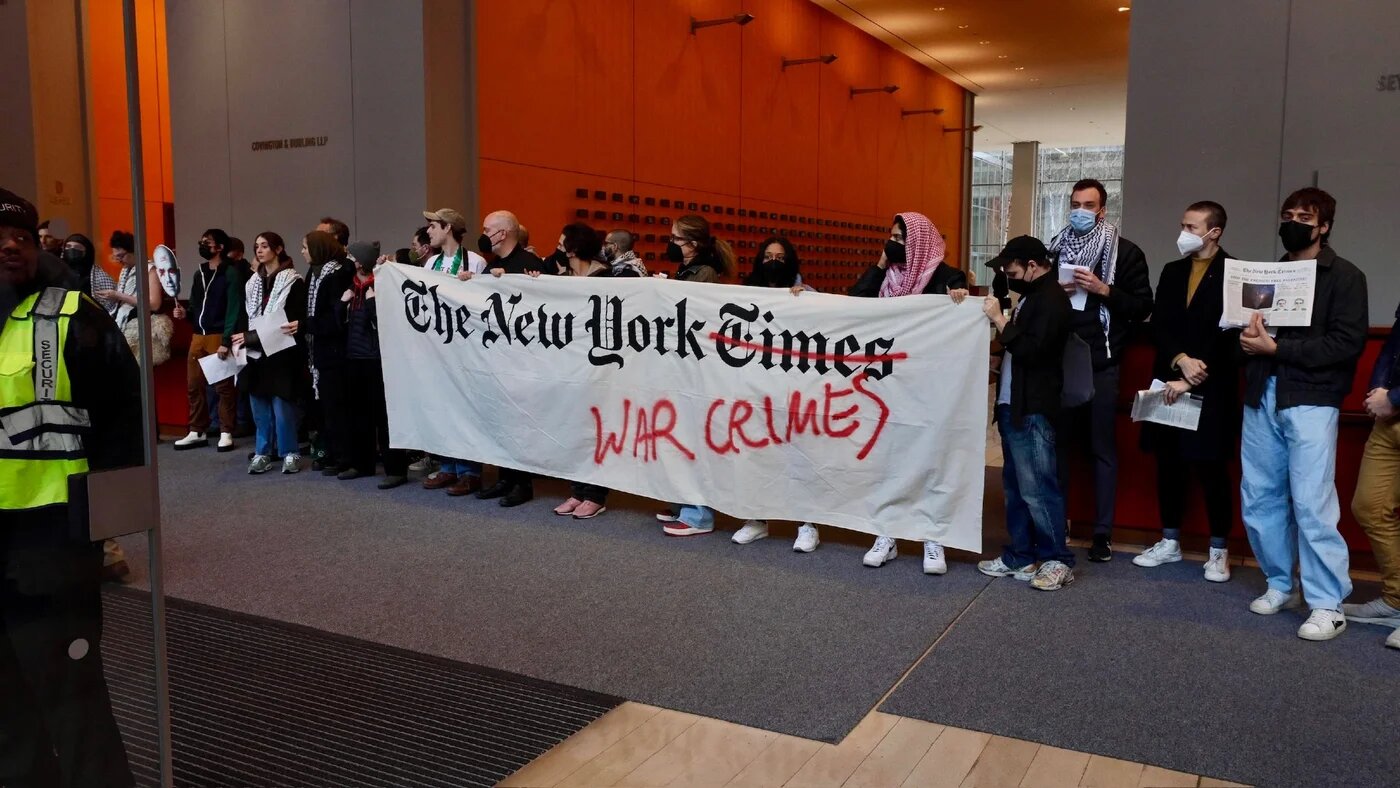 Activists protest in the lobby of the New York Times in March 2024 (Writers Against the War on Gaza) 