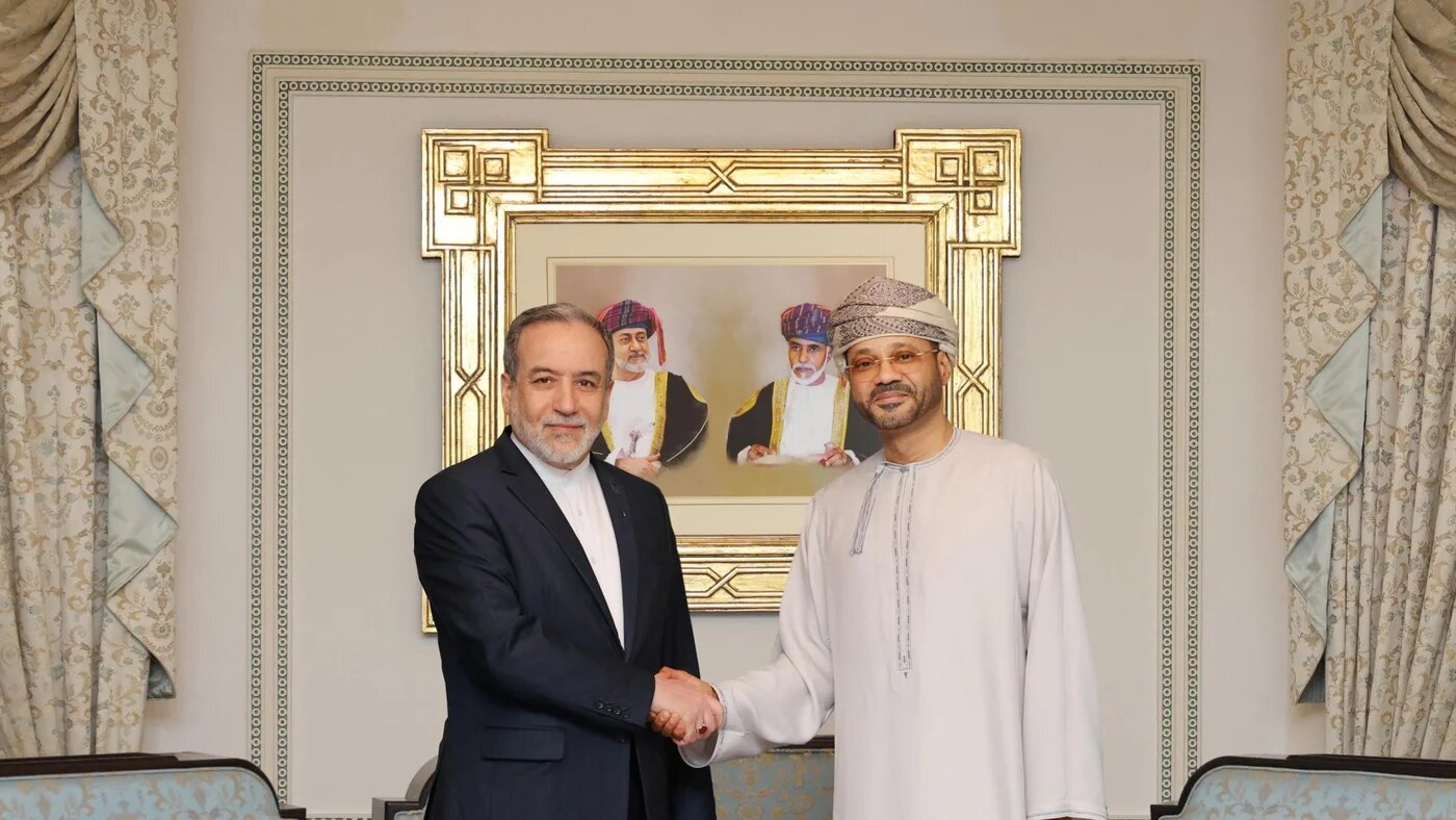 Iranian Foreign Minister Abbas Araqchi meeting with Omani Foreign Minister Sayyid Badr Albusaidi (R) in Muscat, Oman, 6 February 2026. (Omani Ministry of Foreign Affairs/ Handout via Reuters)