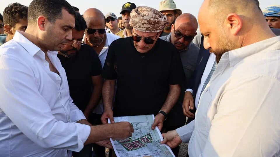 Ibrahim al-Organi (C) looking at construction plans during the event inaugurating the Sisi City and Union of Arab Tribes, 1 May 2024 (Facebook/Alorgani)