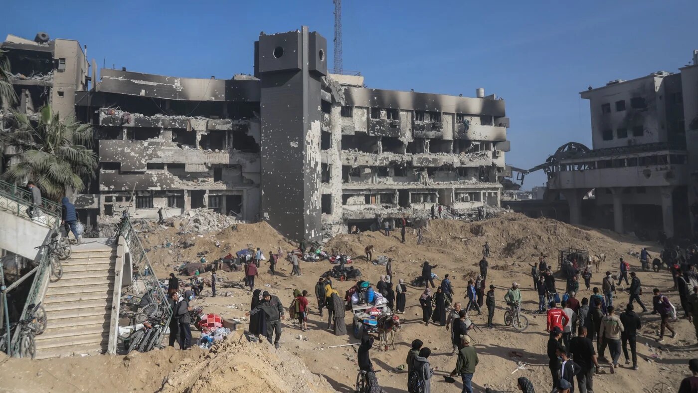 The ground around al-Shifa hospital is heavily plowed up, and numerous buildings outside the facility have either been flattened or burned down (MEE/Mohammed al-Hajjar)