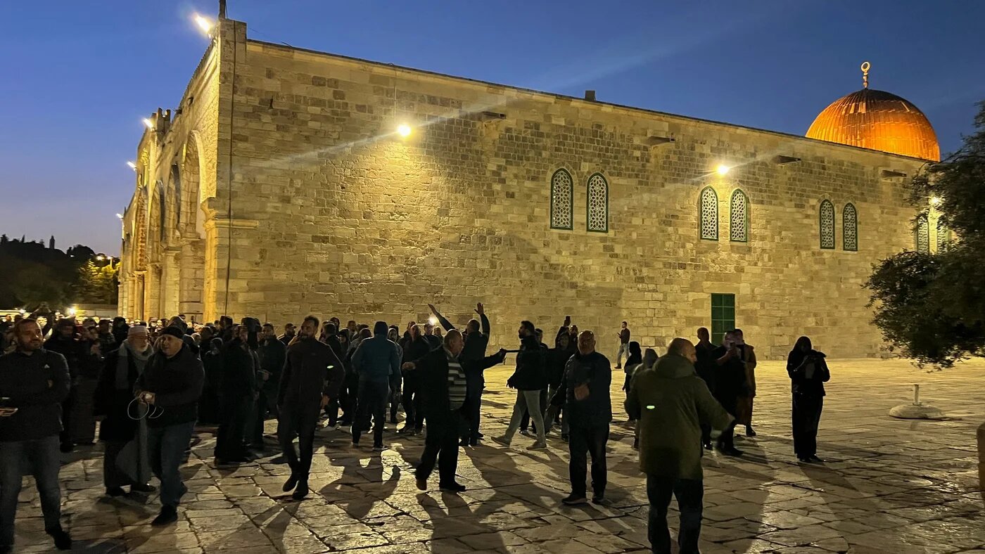 Palestinians are confronted by Israeli security forces at the Al-Aqsa Mosque compound in Jerusalem, on 5 April 2023 (AFP)