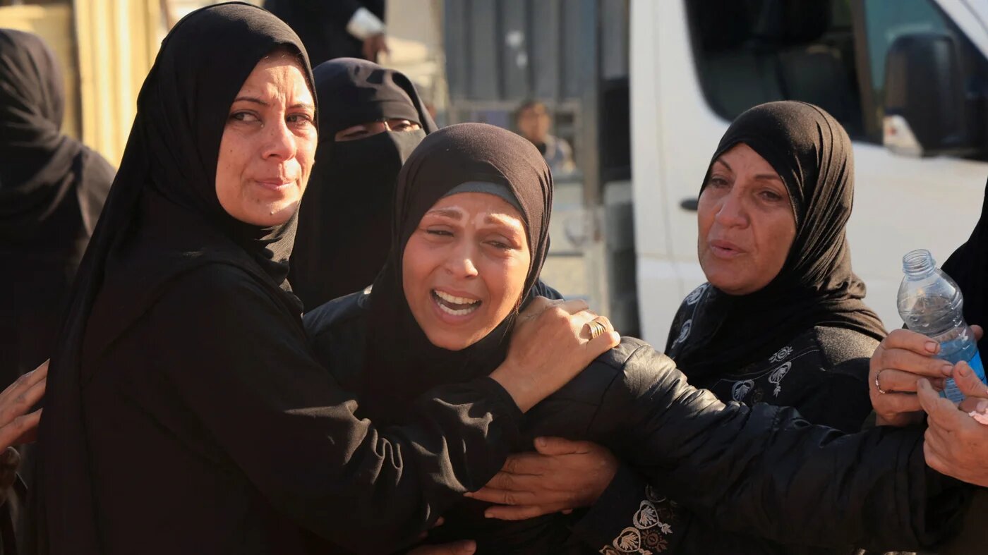 Mourners attend the funeral of Palestinians who were killed in an Israeli strike on tents, at Nasser Hospital in Khan Younis in the southern Gaza Strip, 4 December 2025 (Reuters)