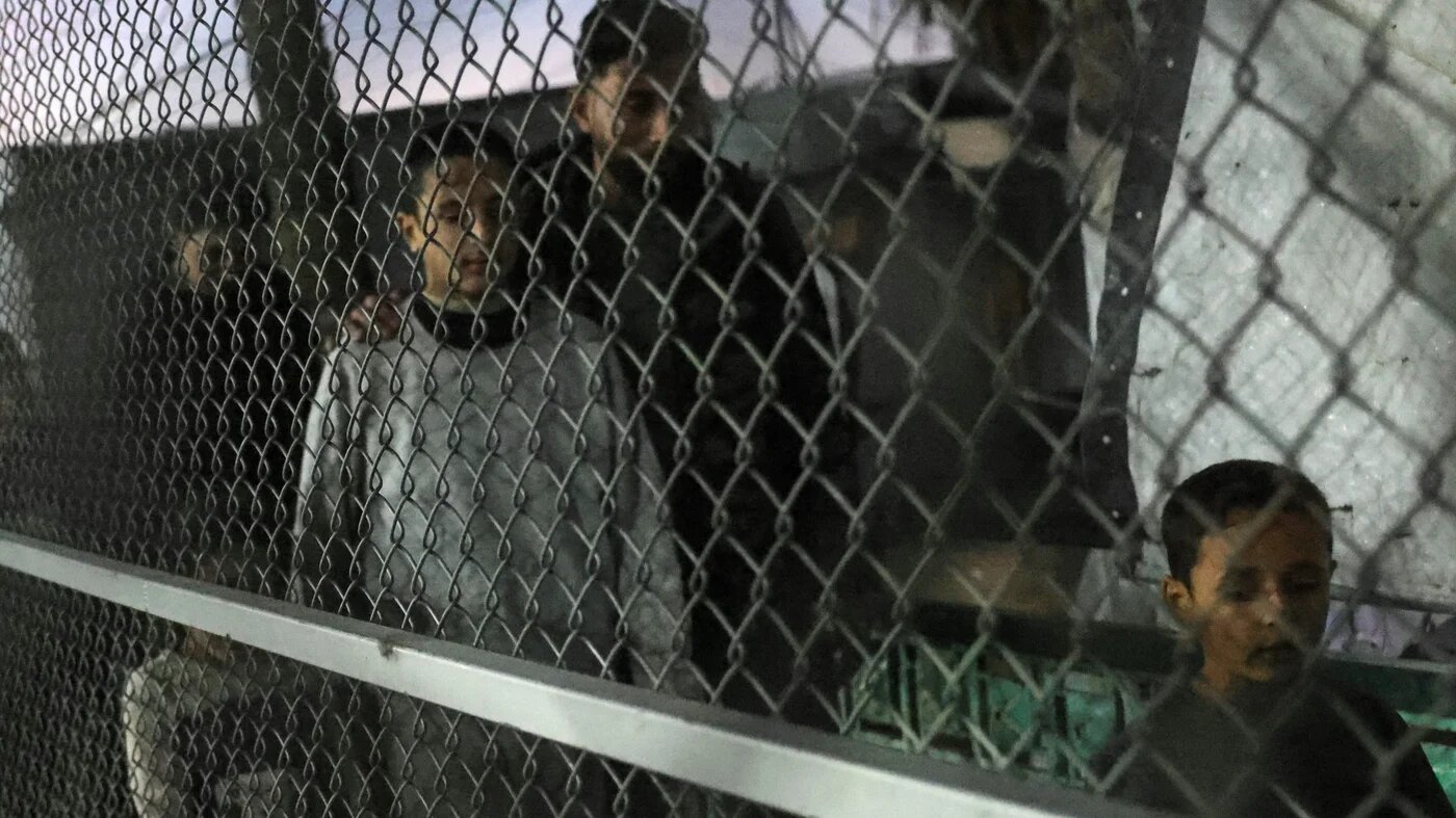 Palestinian youth from Gaza released from Israeli detention under the ceasefire deal on 2 December 2025 (AFP/Bashar Taleb)
