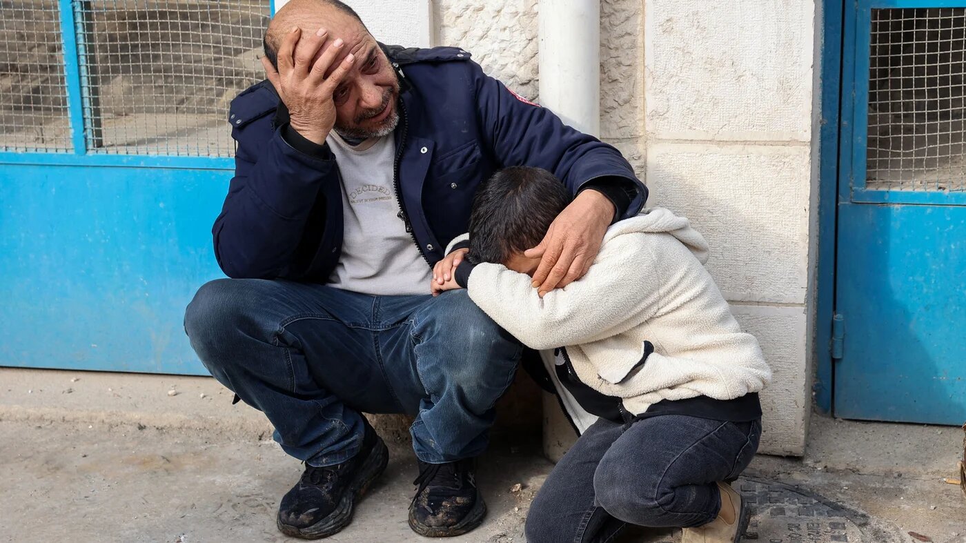 Palestinians mourn outside the Jenin governmental hospital after a several were killed during an Israeli air strike on the occupied West Bank city's refugee camp on 16 January, 2025 (AFP/Zain Jaafar)