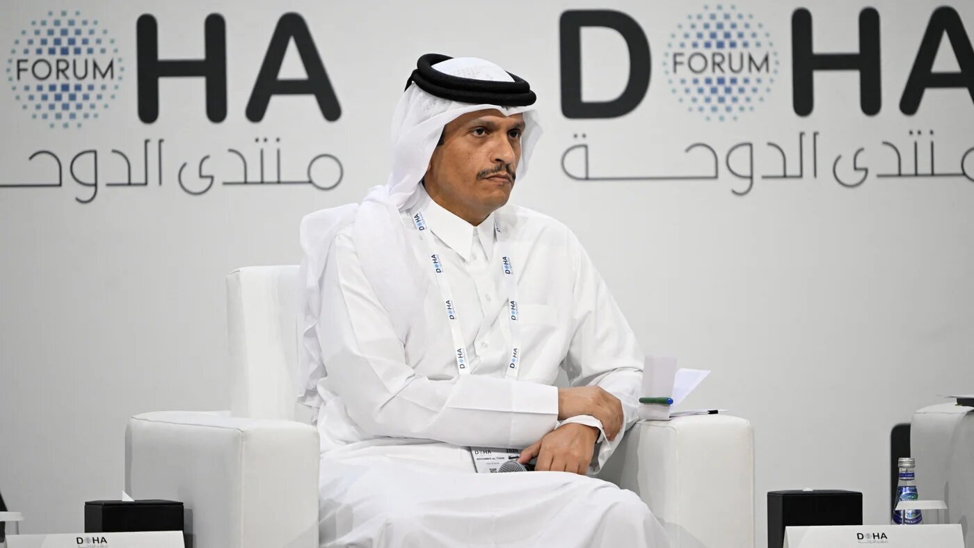 Qatar's Prime Minister and Foreign Minister Mohammed bin Abdulrahman Al Thani attends a session on the opening day of the Doha Forum on 6 December 2025 (AFP)