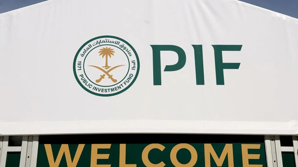 The logo for Saudi Arabia’s Public Investment Fund is pictured during an event in Indian Wells, California, on 13 March 2024 (Matthew Stockman/Getty Images/AFP)