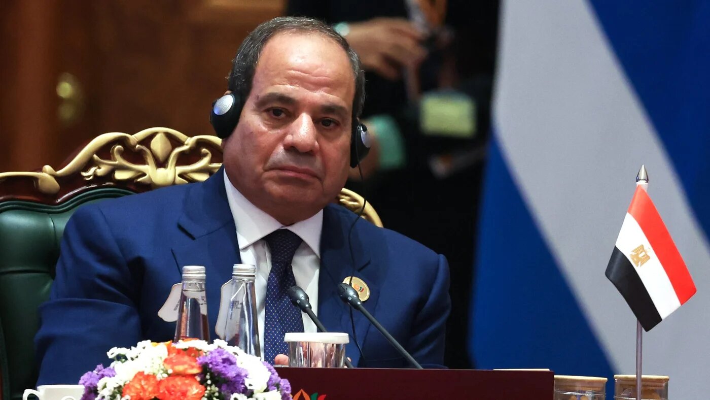 In this pool photograph distributed by the Russian state agency Sputnik, Egypt's President Abdel Fattah al-Sisi attends the 18th BRICS Summit in New Delhi on September 13, 2026. Alexander KAZAKOV / POOL / AFP
