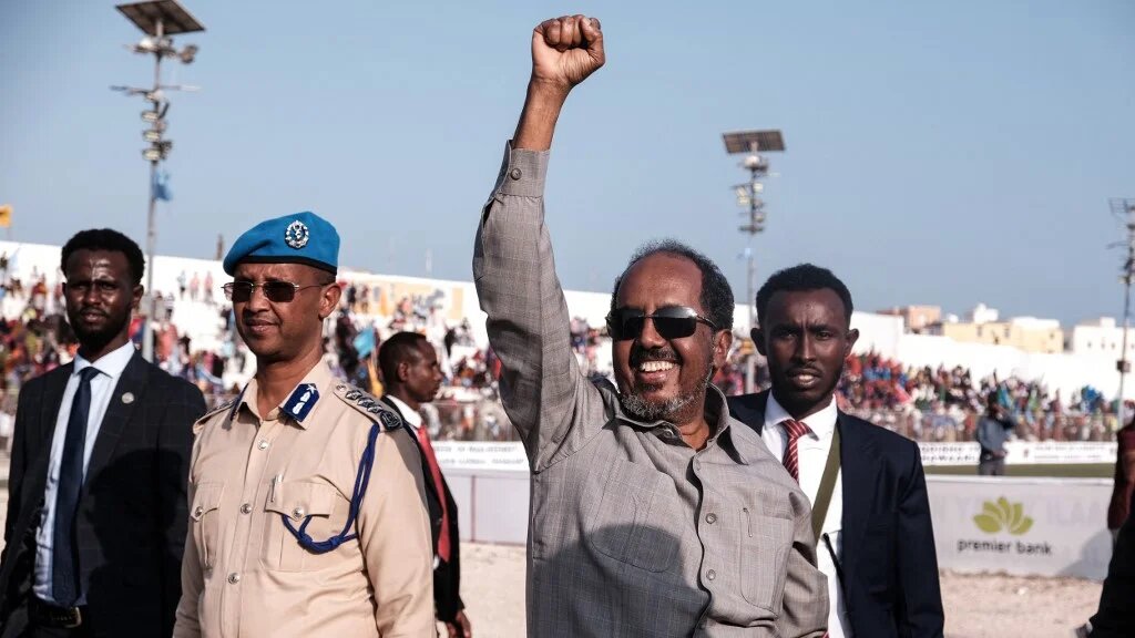 Somali President Hassan Sheikh Mohamud (C) attends a rally against al-Shabab in Mogadishu on 12 January 2023 (AFP)