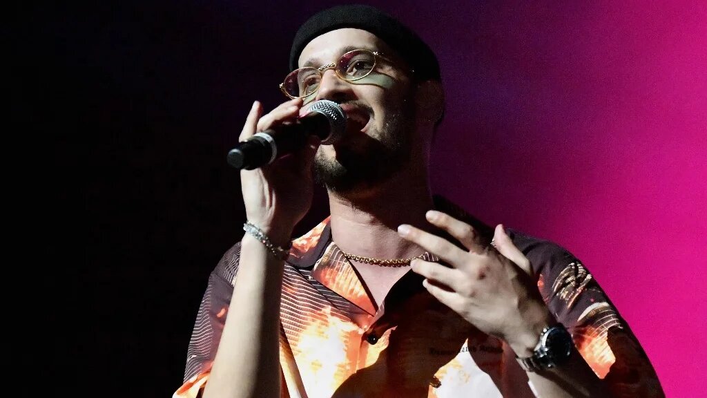 « Je ne pensais pas qu’un jour dans ma vie j’allais venir chanter ici. Là, je suis là et franchement, je ‘’kiffe’’ » - Soolking (AFP/Angela Weiss)