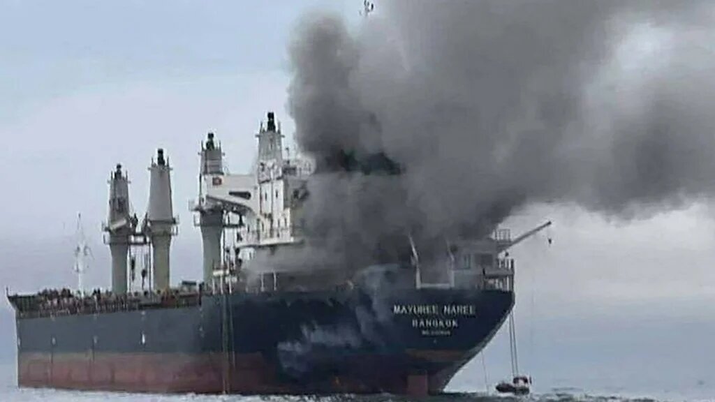 Smoke rises from a ship after an attack near the Strait of Hormuz, amid the US-Israeli conflict with Iran, on 11 March 2026 (Royal Thai Navy/AFP)
