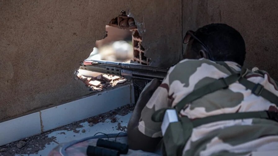 A Sudanese soldier mans a position in Khartoum on 3 November 2024 (Amaury Falt-Brown/AFP)
