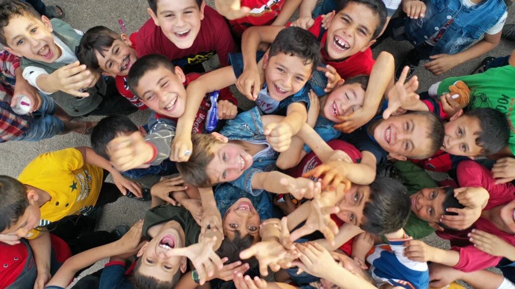 Syrian children play in a makeshift playground to mark Eid al-Fitr (AFP)
