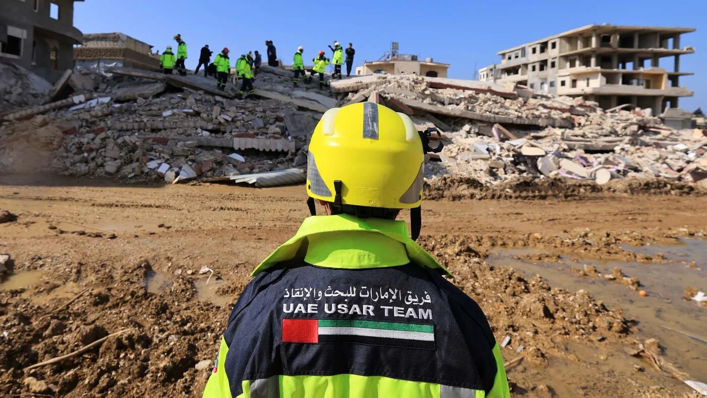 An Emirati search and rescue team in the town of Jableh in Latakia, northwestern Syria, on 12 February, 2023 (AFP)