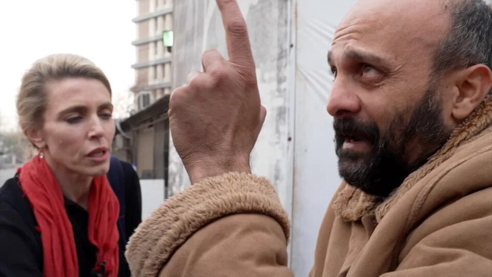 In a dramatic video accused of being staged, CNN’s Clarissa Ward, left, helps rescue a man, who was later revealed to be an intelligence officer from the deposed regime, from a Syrian prison last week (CNN)