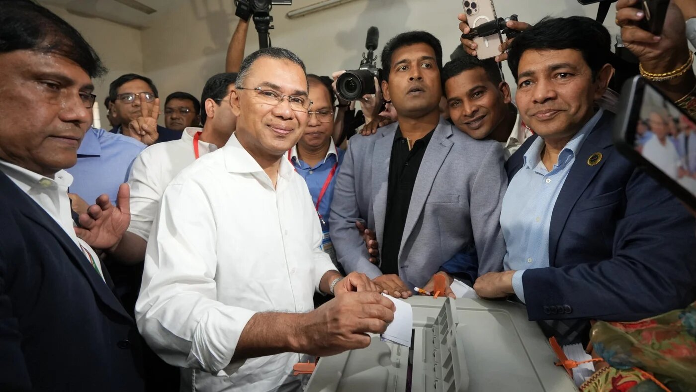 Bangladesh Nationalist Party (BNP) chairman and election candidate Tarique Rahman (C) casts his ballot at a polling station during Bangladesh's general election in Dhaka on 12 February 2026 (AFP/Monzur Morsed Ricky)