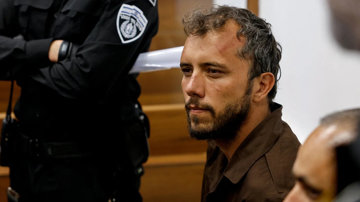 Activist Thiago Avila, a member of the Global Sumud Flotilla detained by Israel, sits at a magistrate's court hearing in Ashkelon, southern Israel, 3 May, 2026 (Amir Cohen/Reuters)