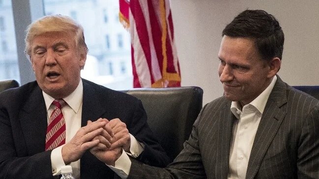 Donald Trump with Peter Thiel during a meeting with technology executives at Trump Tower in New York City in December 2016 (AFP)