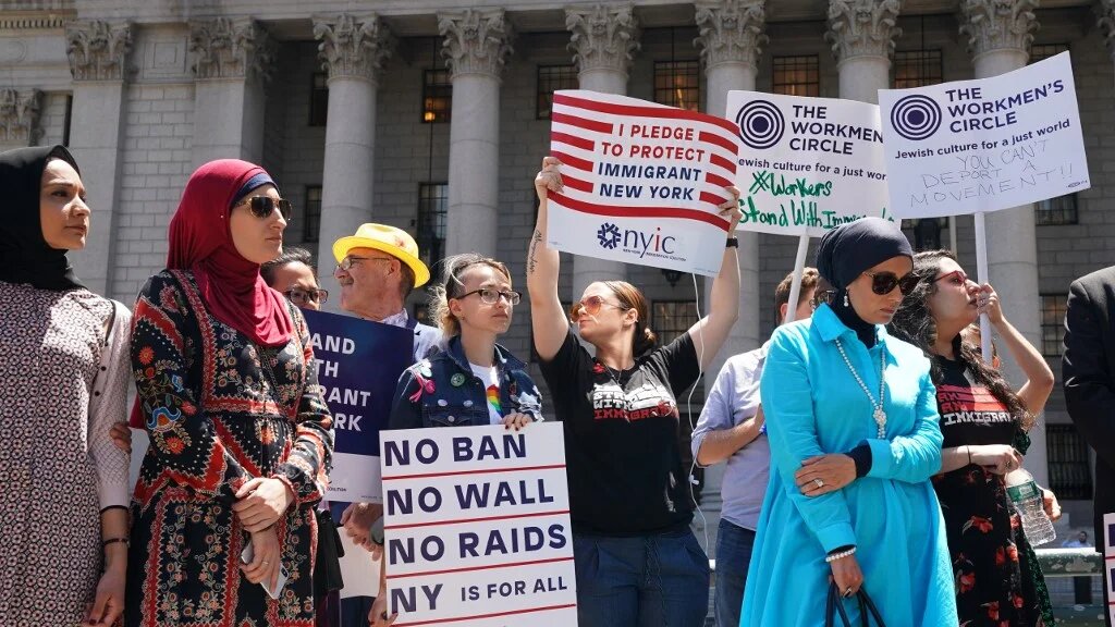 The New York Immigration Coalition holds a news conference on Trump's Muslim ban in 2018.