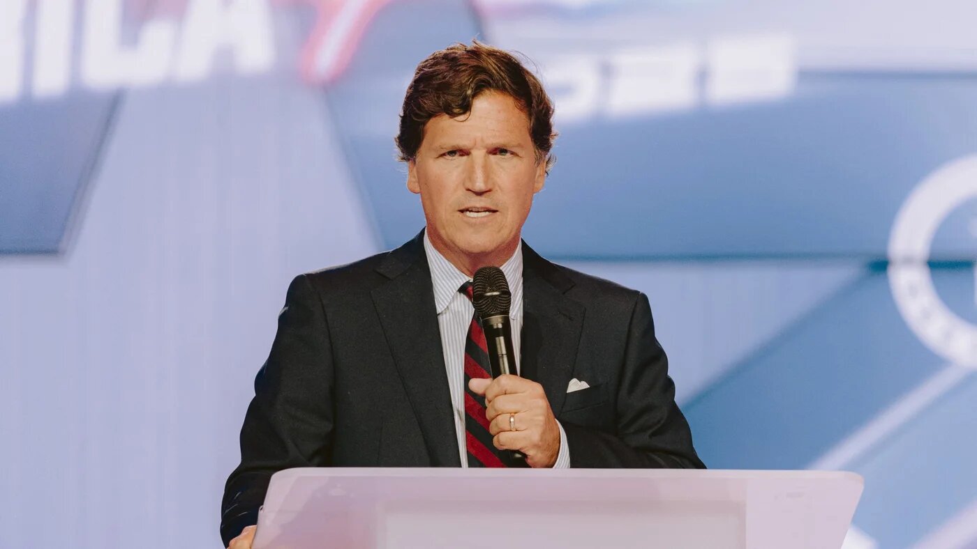 US political commentator Tucker Carlson speaks at Turning Point's annual AmericaFest conference in Phoenix, Arizona on 18 December 2026 (Olivier Touron/AFP)